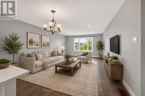 Photo has been virtually staged - 2199 Burke Avenue, Cornwall, ON - Indoor Photo Showing Living Room
