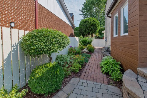 Jardin - 535 Rue De Briançon, Laval (Laval-Des-Rapides), QC - Outdoor With Exterior