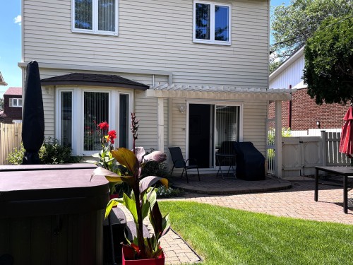 Face arrière - 535 Rue De Briançon, Laval (Laval-Des-Rapides), QC - Outdoor With Deck Patio Veranda With Exterior
