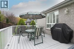 Grey composite decking with a white railing system - 