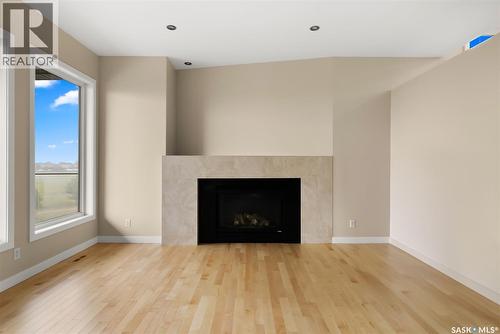 6110 Wascana Court, Regina, SK - Indoor Photo Showing Living Room With Fireplace
