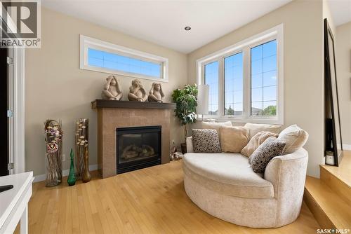 6110 Wascana Court, Regina, SK - Indoor Photo Showing Living Room With Fireplace