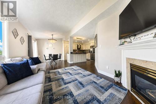 764 Avocado Crescent, Mississauga, ON - Indoor Photo Showing Living Room With Fireplace