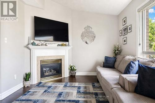 764 Avocado Crescent, Mississauga, ON - Indoor Photo Showing Living Room With Fireplace