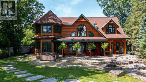 1040 7Th Heaven Lane, Bracebridge (Muskoka (N)), ON - Outdoor With Deck Patio Veranda With Facade
