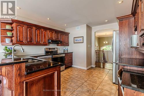 383 Peek-A-Boo Trail, Tiny, ON - Indoor Photo Showing Kitchen With Stainless Steel Kitchen With Double Sink