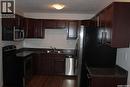 2 2106 Ste Cecilia Avenue, Saskatoon, SK  - Indoor Photo Showing Kitchen With Double Sink 