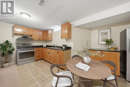 1382 Avon Drive, Mississauga, ON - Indoor Photo Showing Kitchen With Double Sink