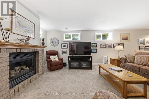 31 Huron Drive, Brighton, ON - Indoor Photo Showing Living Room With Fireplace