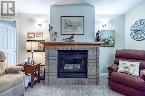 31 Huron Drive, Brighton, ON - Indoor Photo Showing Living Room With Fireplace