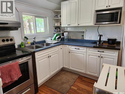 803 97Th Avenue, Tisdale, SK - Indoor Photo Showing Kitchen With Double Sink