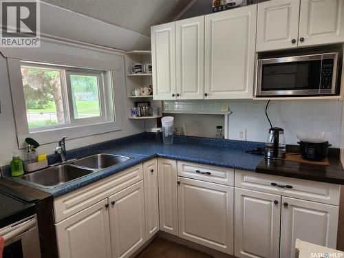 803 97Th Avenue, Tisdale, SK - Indoor Photo Showing Kitchen With Double Sink