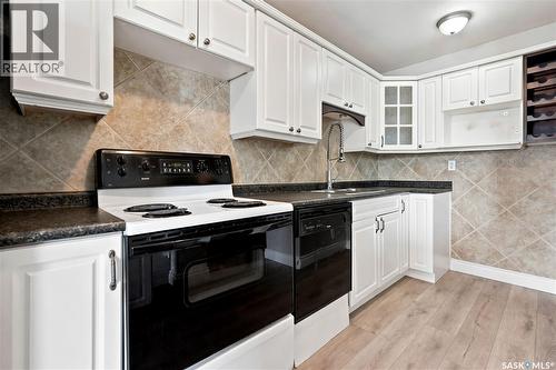6 1292 Gordon Road, Moose Jaw, SK - Indoor Photo Showing Kitchen With Double Sink