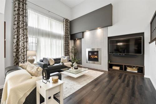 3 Tennant Gate, Winnipeg, MB - Indoor Photo Showing Living Room With Fireplace