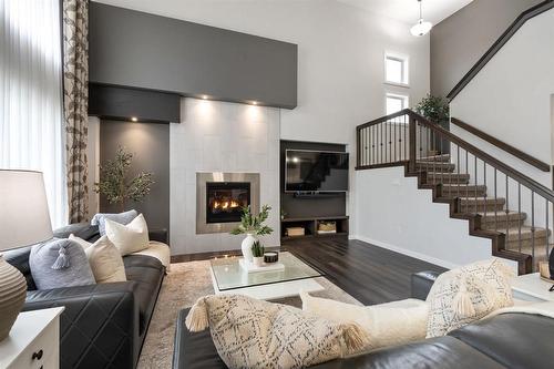 3 Tennant Gate, Winnipeg, MB - Indoor Photo Showing Living Room With Fireplace