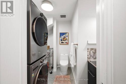Main floor laundry/powder with LG washer & dryer - 212 Provender Avenue, Ottawa, ON - Indoor Photo Showing Laundry Room