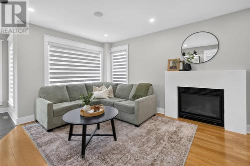 7 Emily Carr Crescent, Caledon, ON - Indoor Photo Showing Living Room With Fireplace