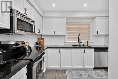 7 Emily Carr Crescent, Caledon, ON - Indoor Photo Showing Kitchen With Double Sink With Upgraded Kitchen