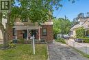 Brick exterior with partial horizontal siding, covered front porch, and a paved driveway - 456 Margaret Street, Cambridge, ON  - Outdoor 