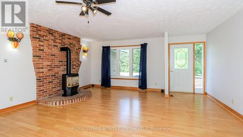 52 Denney Drive, Essa, ON - Indoor Photo Showing Other Room With Fireplace