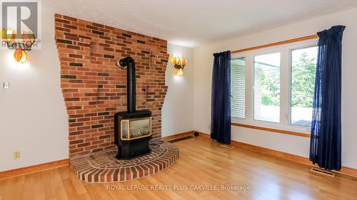 52 Denney Drive, Essa, ON - Indoor With Fireplace