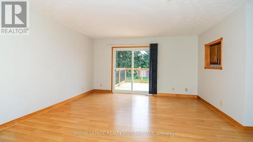 Virtually removed Closet door to show options - 52 Denney Drive, Essa, ON - Indoor Photo Showing Other Room