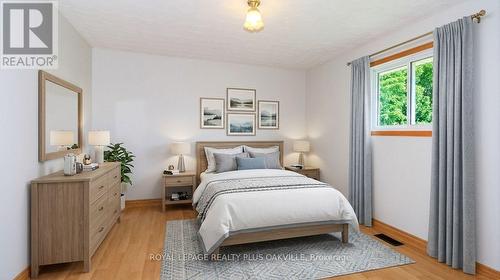 Primary Bedroom Virtually Staged - 52 Denney Drive, Essa, ON - Indoor Photo Showing Bedroom