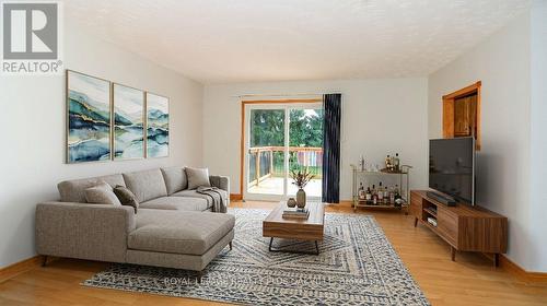 Living Area - Door removed and Virtually Staged. - 52 Denney Drive, Essa, ON - Indoor Photo Showing Living Room
