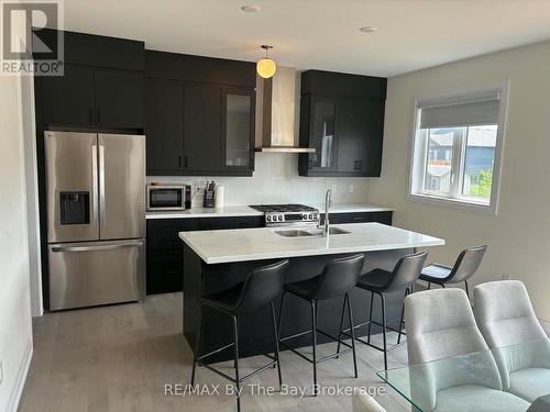 Upper Unit - 218 Mapleside Drive, Wasaga Beach, ON - Indoor Photo Showing Kitchen With Upgraded Kitchen