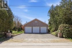 Three-car Garage | Full Stone Exterior - 