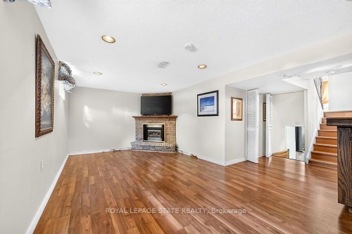 16 Sunshine Court, Hamilton, ON - Indoor Photo Showing Other Room With Fireplace