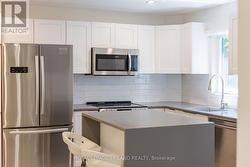 Ground level in-law suite kitchen - 