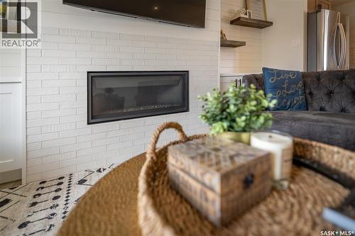123 Hodges Crescent, Moose Jaw, SK - Indoor Photo Showing Living Room With Fireplace