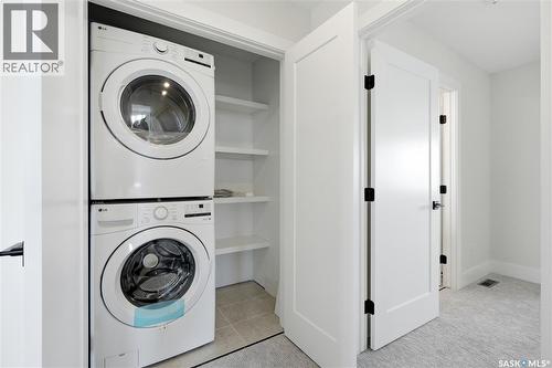 218 Veterans Drive, Warman, SK - Indoor Photo Showing Laundry Room