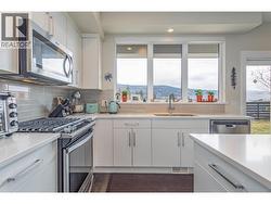 Soft close cabinets and quartz countertops! - 