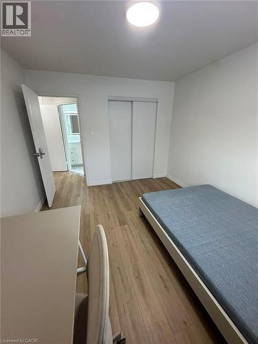 Interior room featuring wood-finish flooring and white walls - 145 Macgregor Crescent Unit# 2 (R1), Waterloo, ON - Indoor