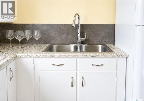 108 Third Avenue S, Pierceland, SK - Indoor Photo Showing Kitchen With Double Sink