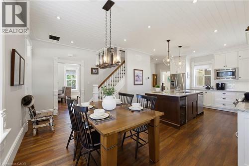 Open-concept living space featuring wood-finish flooring, white shiplap ceilings, and recessed lighting - 8430 Road 146, Listowel, ON - Indoor Photo Showing Other Room