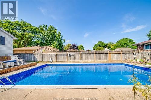 5122 Colbourne Drive, Windsor, ON - Outdoor With In Ground Pool With Backyard