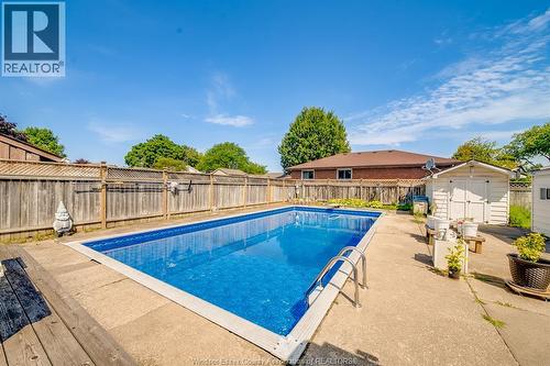 5122 Colbourne Drive, Windsor, ON - Outdoor With In Ground Pool With Backyard