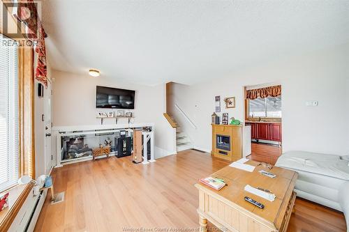 5122 Colbourne Drive, Windsor, ON - Indoor Photo Showing Living Room With Fireplace
