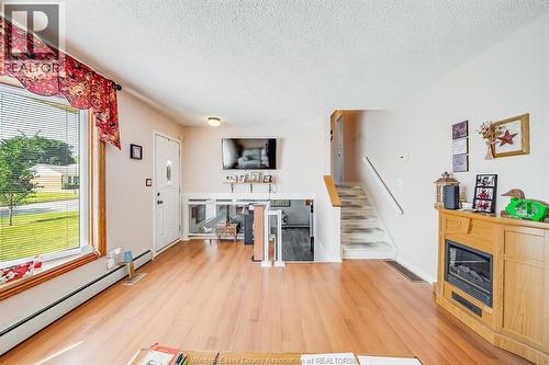 5122 Colbourne Drive, Windsor, ON - Indoor Photo Showing Living Room With Fireplace