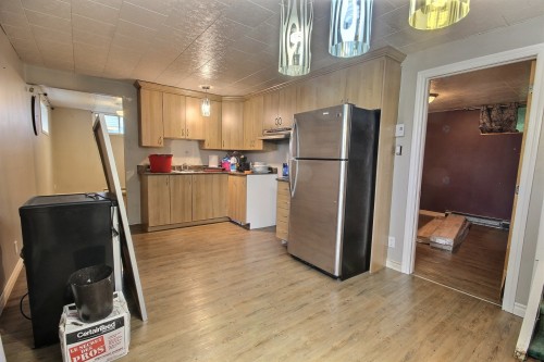Salle familiale - 1017 Rue Martel, Rouyn-Noranda, QC - Indoor Photo Showing Kitchen