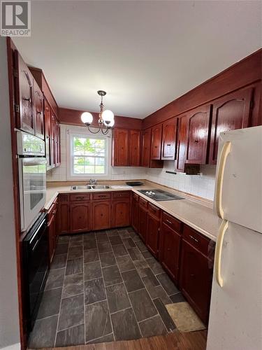 4 Morley Drive, Placentia, NL - Indoor Photo Showing Kitchen With Double Sink