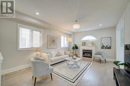 122 Mistysugar Trail, Vaughan, ON - Indoor Photo Showing Living Room With Fireplace