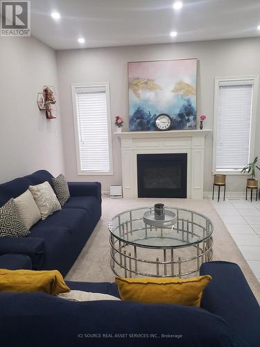 93 Sonoma Valley Crescent, Hamilton, ON - Indoor Photo Showing Living Room With Fireplace