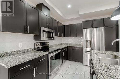 93 Sonoma Valley Crescent, Hamilton, ON - Indoor Photo Showing Kitchen With Stainless Steel Kitchen With Double Sink With Upgraded Kitchen