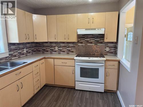 100 105Th Street W, Saskatoon, SK - Indoor Photo Showing Kitchen With Double Sink