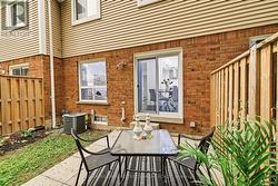 Private patio with fence at rear - 