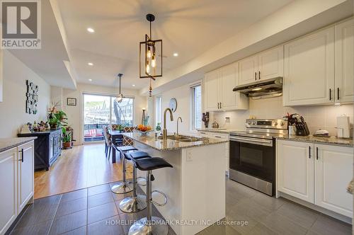 97 Cornell Centre Boulevard, Markham, ON - Indoor Photo Showing Kitchen With Double Sink With Upgraded Kitchen